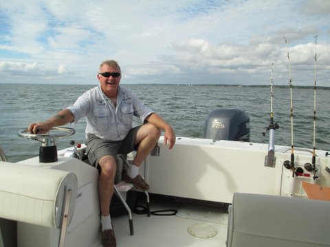 Capt. Alexander at the helm of the Motor Yacht Soulmate